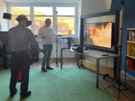 Fire safety officer tries out the VR trainer Flamecoach